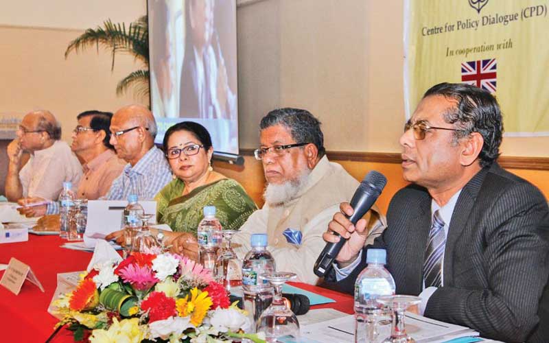 Centre for Policy Dialogue (CPD) executive director Professor Mustafizur Rahman speaks at a dialogue on education budget on Monday. CPD and Campaign for Popular Education jointly organised the programme at a city hotel. — FE Photo