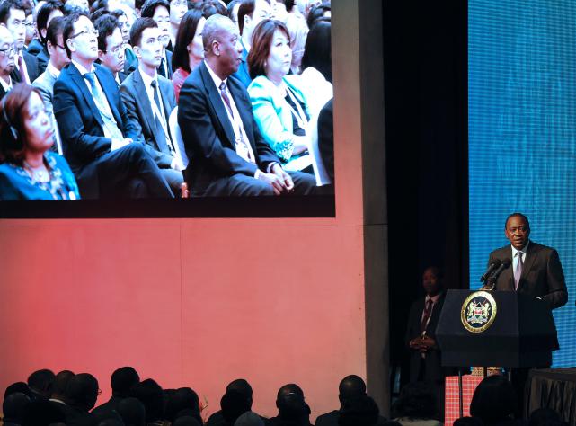 Kenya's President Uhuru Kenyatta addresses delegates at the official opening of the Tenth World Trade Organisation ministerial conference. Photo: AFP