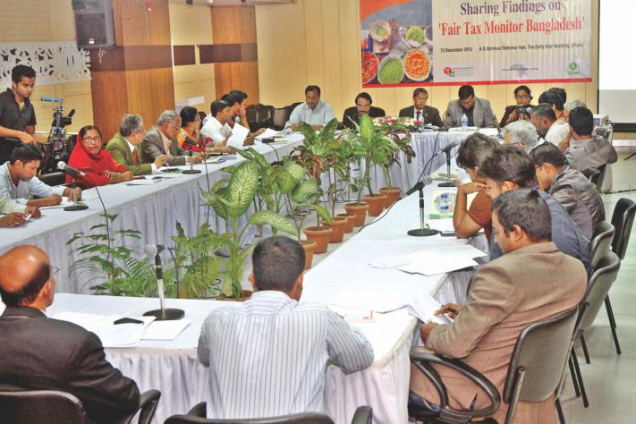 Analysts take part in a discussion on tax monitoring, organised by SUPRO, a nongovernmental organisation, at The Daily Star Centre yesterday. Photo: Star